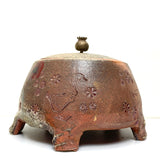 Lidded poppy canister