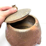 Lidded poppy canister